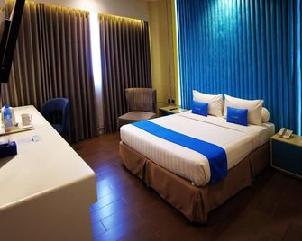 Zenith Hotel - Kendari - Slaapkamer