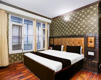 Super Collection O Mall Road Formerly Hotel Shubham - Shimla - Habitación