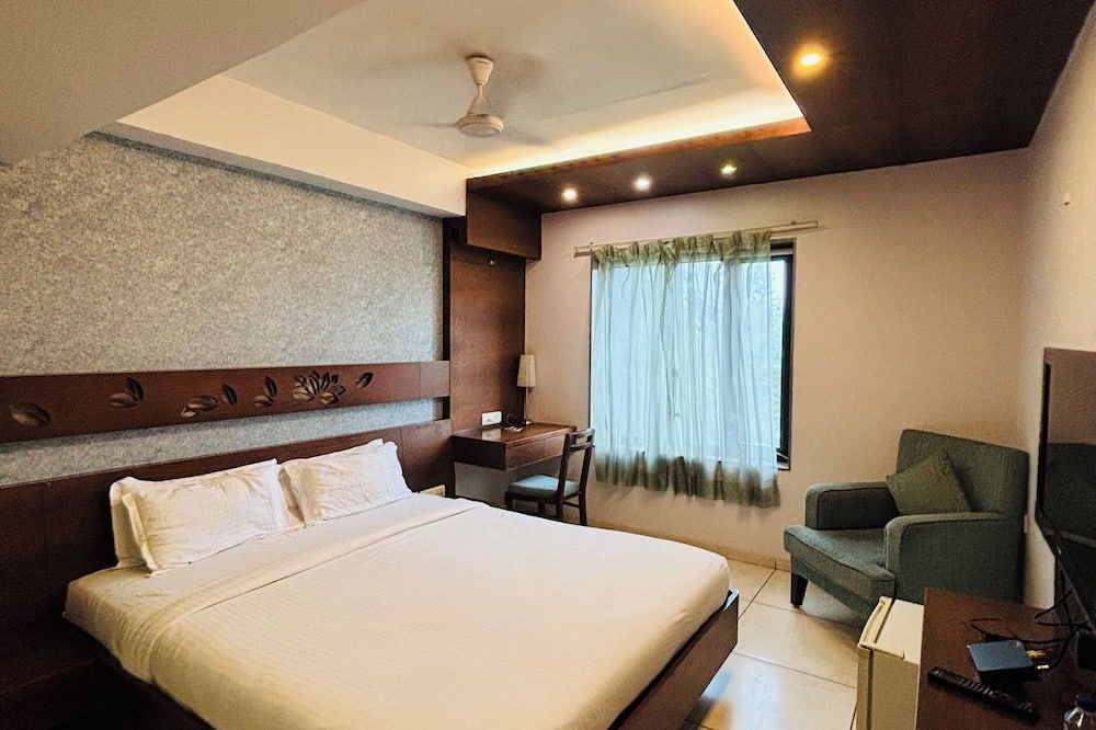 هوتل كانان - أحمد أباد - غرفة نوم