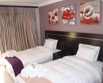 마실리 게스트하우스 & 컨퍼런스 - 토호얀도우 - 침실