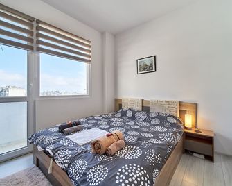 Cozy Apartment with Balcony on the Black Sea- part of the family 'Vicki Apart - Варна - Спальня