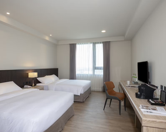 Floramos Hotel - Tianwei Township - Habitación