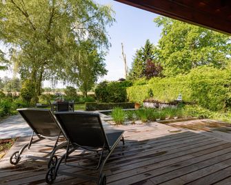 Huswell - Tranquil retreat, cozy chalet in the heart of Urse - Aalter