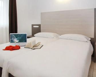 Residence Maroadi - Nago–Torbole - Camera da letto