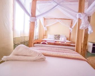 Kilimanjaro Vines Retreat Hotel Moshi - Moshi - Bedroom