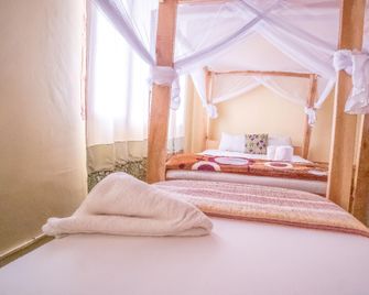 Kilimanjaro Vines Retreat Hotel Moshi - Moshi - Bedroom