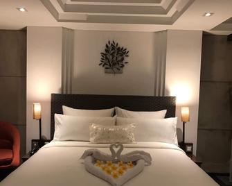 Anshel Hotel - Kuta - Bedroom