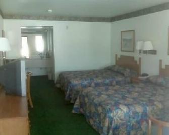 Diboll Inn and Suites - Diboll - Bedroom