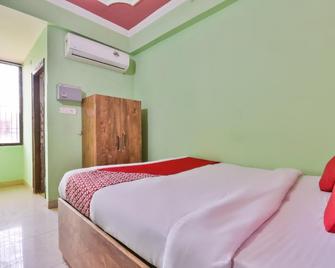 OYO Hotel Happy Journey - Patna - Kamar Tidur