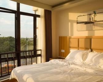 Greentree Anhui Wuhu Sanshan Development District Express Hotel - Wuhu - Habitación