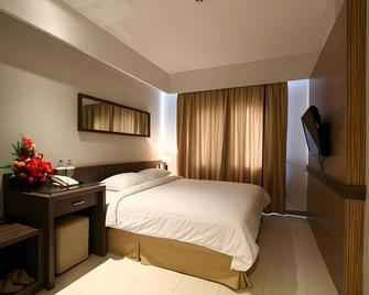 Cititel Hotel Pekanbaru - Pekanbaru - Slaapkamer