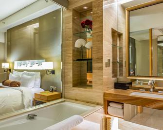Grand Hotel Qinhuang - Qinhuangdao - Schlafzimmer