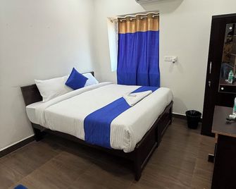 Coco Net Hotel - Haiderabad - Slaapkamer