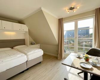 Haus an den Wiesen Seestern - Tinnum - Schlafzimmer