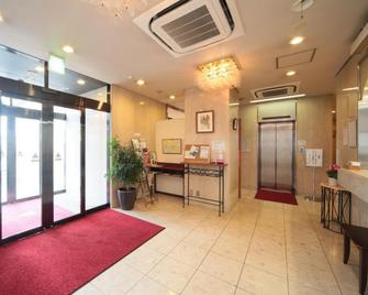 Kishibe Station Hotel - Suita - Front desk