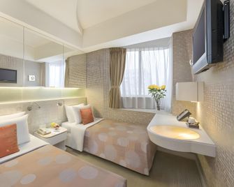 Silka Seaview Hotel - Hongkong - Schlafzimmer