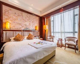 Jin Peng Plaza Hotel - Chuzhou - Slaapkamer