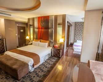 Spring Breeze Hotel - Hualien City - Bedroom