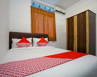 OYO 1844 Bravo Residence - Pangkalpinang - Bedroom