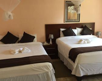 Plateau Guest House - Kasane - Bedroom