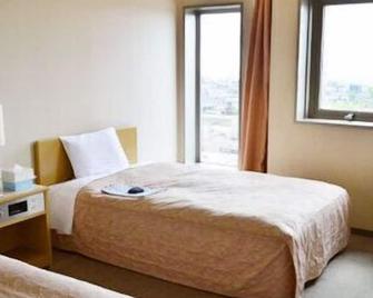 Hotel Minamikan - Uozu - Спальня