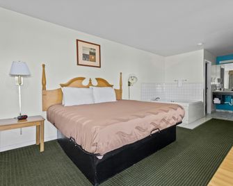 Capital O First Heritage Inn Rantoul Il I 57 - Rantoul - Camera da letto