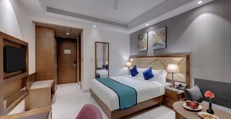 Click Hotel Aurangabad - Aurangabad - Bedroom