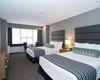 Sandman Signature Calgary Downtown Hotel - Calgary - Bedroom