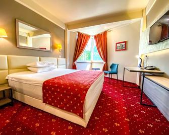 Best Western Plus Lido Hotel - Timisoara - Bedroom
