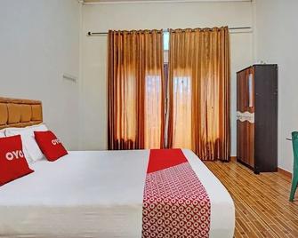 OYO 93264 Penginapan Syari'ah Berlian - Takengon - Habitación
