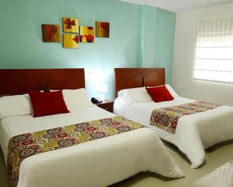 Hotel Prado 34 West - בוקאראמנגה - חדר שינה