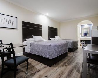 Palace Inn Tx-249 - Jersey Village - Slaapkamer