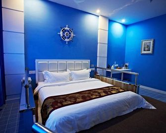 City Garden Hotel Fuxin Jiefang Main Street - Fuxin - Bedroom