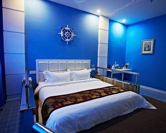 City Garden Hotel Fuxin Jiefang Main Street - Fuxin - Bedroom