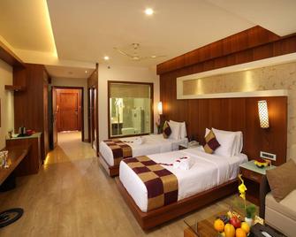 Amber Dale Luxury Hotel & Spa, Munnar - Munnar - Bedroom