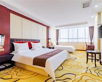 Rongzi Hotel (Baotou Wanda Plaza) - Baotou - Bedroom