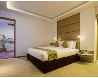 Hotel Tulip Bangalore - Bengaluru - Bedroom