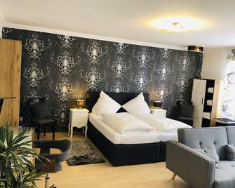 Hotel Haus Herrenweide - Diepholz - Bedroom