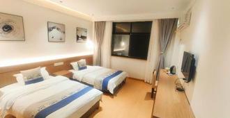 Jiuhuashan New Century Hotel - Chizhou - Bedroom