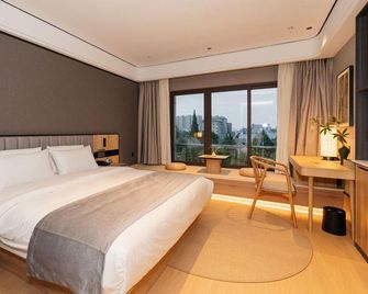 Pero Hotel (Yancheng High-speed Railway Station Shuijie) - Yancheng - Camera da letto