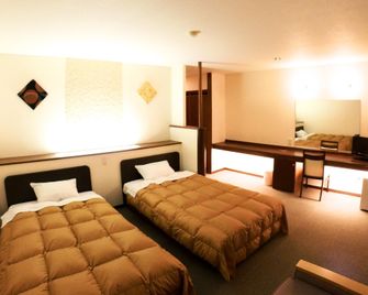 هوليداي بلازا شيجاكوجين - يامانوشي - غرفة نوم