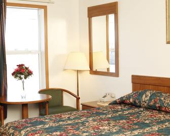Travelier Motel - Macon - Bedroom