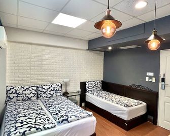Taipei Triple Tiger Inn - טאיפיי - חדר שינה