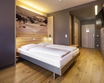 Jufa Hotel Malbun - Triesenberg - Slaapkamer