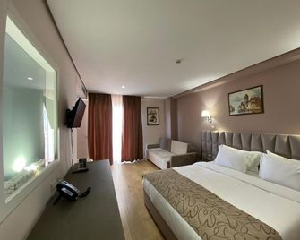 Doanesia Premium Hotel & Spa - Tirana - Sovrum