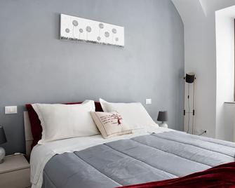 Casa Vacanze La Porta in Piazza - Guarene - Habitación