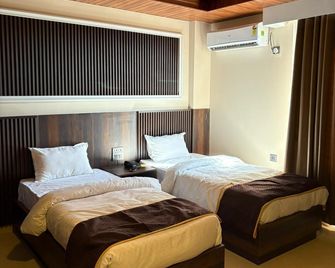 The Layover Hotel - Dimāpur - Bedroom