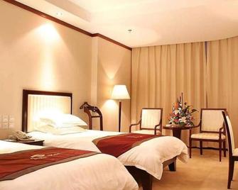 Yantai Jinghai Hotel - Yantai - Bedroom