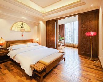 Liaokuo Jingshe Hotel - Qujing - Habitación