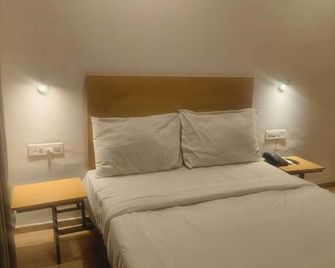 Wishotel Xpress Hotel Gk Inn - Dewas - Bedroom